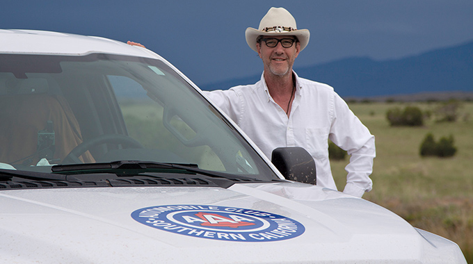 AAA Field Cartographer Shane Henry with his Mapping Unit Truck, a Ford F-150.