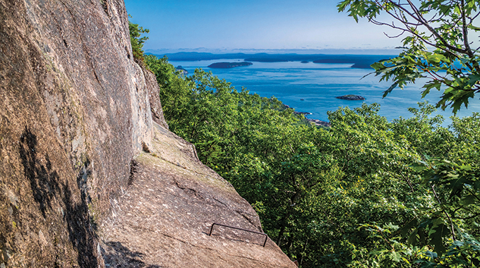 Hands and feet are needed for a hike on the Precipice Trail in Acadia National Park. | Photo by CheriAlguire/stock.adobe.com.